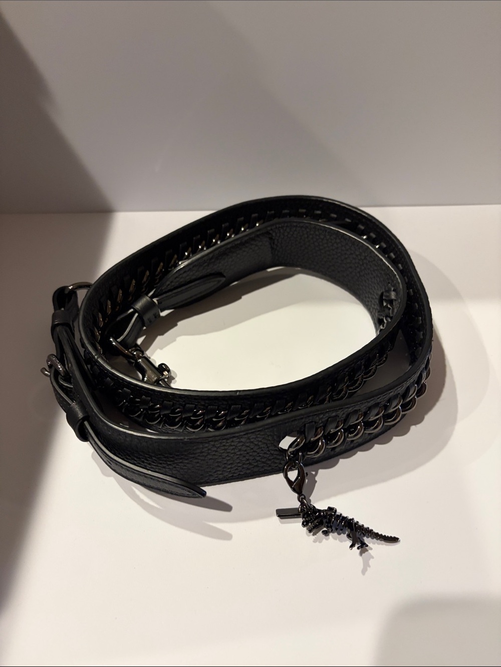 Coach Black Pebbled Leather Strap with Chain and Dinosaur Charm